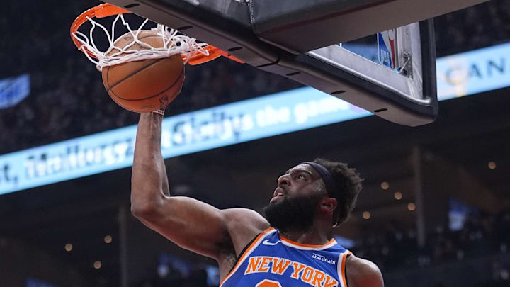Mar 3, 2026; Toronto, Ontario, CAN; New York Knicks center Mitchell Robinson (23) shoots against the Toronto Raptors during the first half at Scotiabank Arena. Mandatory Credit: John E. Sokolowski-Imagn Images Mar 3, 2026; Toronto, Ontario, CAN; New York Knicks center Mitchell Robinson (23) shoots against the Toronto Raptors during the first half at Scotiabank Arena. Mandatory Credit: John E. Sokolowski-Imagn Images