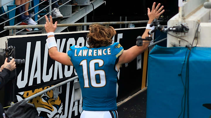 Jacksonville Jaguars quarterback Trevor Lawrence (16) runs off the field after an NFL football matchup Sunday, Oct. 6, 2024 at EverBank Stadium in Jacksonville, Fla. The Jaguars edged the Colts on a field goal 37-34. [Corey Perrine/Florida Times-Union]