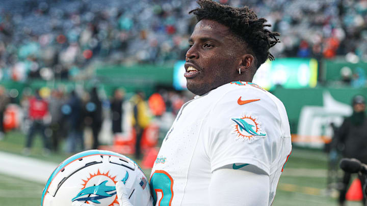 Jan 5, 2025; East Rutherford, New Jersey, USA; Miami Dolphins wide receiver Tyreek Hill (10) on the field before the game against the New York Jets at MetLife Stadium. Mandatory Credit: Vincent Carchietta-Imagn Images