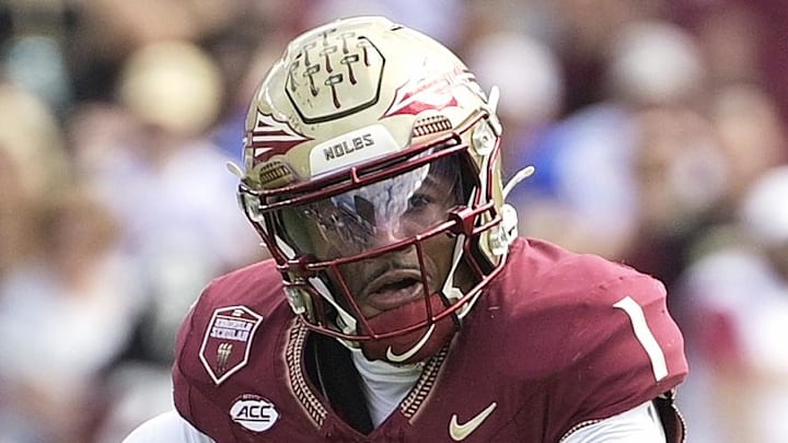 Oct 11, 2025; Tallahassee, Florida, USA; Florida State Seminoles quarterback Thomas Castellanos (1) looks to throw as he is pressured by Pittsburgh Panthers linebacker Kyle Louis (9) during the first half at Doak S. Campbell Stadium. Mandatory Credit: Melina Myers-Imagn Images