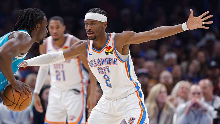Jan 5, 2026; Oklahoma City, Oklahoma, USA; Oklahoma City Thunder guard Shai Gilgeous-Alexander (2) defends Charlotte Hornets guard Sion James (4) during the second quarter at Paycom Center. Mandatory Credit: Alonzo Adams-Imagn Images
