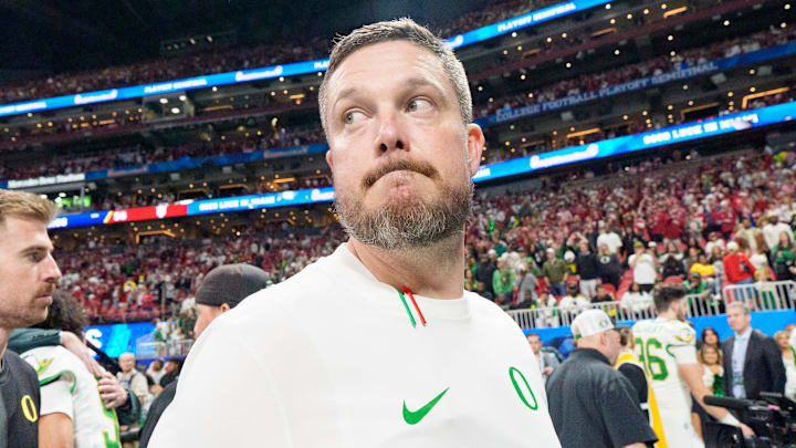 Oregon head coach Dan Lanning walks off the field after the Ducks’ loss as the Oregon Ducks face the Indiana Hoosiers in the Peach Bowl on Jan. 9, 2026, at Mercedes-Benz Stadium in Atlanta, Georgia. Oregon head coach Dan Lanning walks off the field after the Ducks’ loss as the Oregon Ducks face the Indiana Hoosiers in the Peach Bowl on Jan. 9, 2026, at Mercedes-Benz Stadium in Atlanta, Georgia.