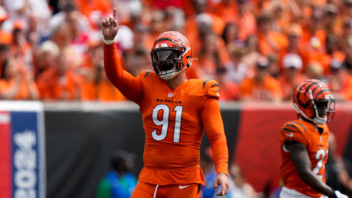 Sep 8, 2024; Cincinnati, Ohio, USA; Cincinnati Bengals defensive end Trey Hendrickson (91) celebrates after a false start penalty on the Patriots in the first quarter of the NFL Week 1 game between the Cincinnati Bengals and the New England Patriots at Paycor Stadium. Mandatory Credit: Sam Greene/USA TODAY Network via Imagn Images Sep 8, 2024; Cincinnati, Ohio, USA; Cincinnati Bengals defensive end Trey Hendrickson (91) celebrates after a false start penalty on the Patriots in the first quarter of the NFL Week 1 game between the Cincinnati Bengals and the New England Patriots at Paycor Stadium. Mandatory Credit: Sam Greene/USA TODAY Network via Imagn Images
