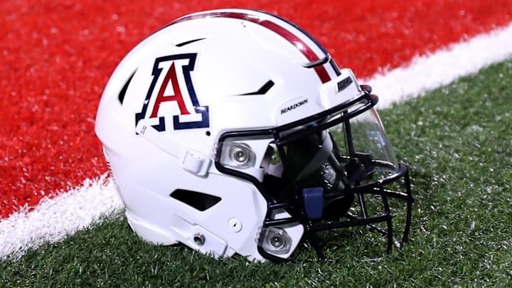 Sep 2, 2023; Tucson, Arizona, USA; Arizona Wildcats quarterback Jayden de Laura (7) helmet on the field after a victory over Northern Arizona Lumberjacks at Arizona Stadium. Mandatory Credit: Zac BonDurant-Imagn Images