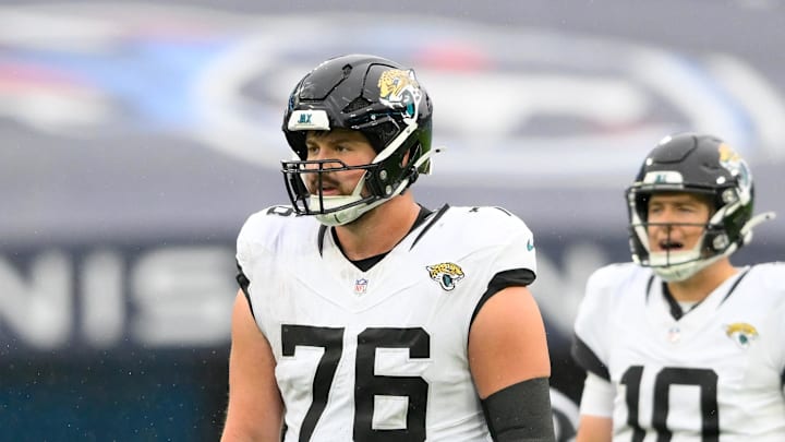 Dec 8, 2024; Nashville, Tennessee, USA; Jacksonville Jaguars guard Ezra Cleveland (76) against the Tennessee Titans during the second half at Nissan Stadium. Mandatory Credit: Steve Roberts-Imagn Images Dec 8, 2024; Nashville, Tennessee, USA; Jacksonville Jaguars guard Ezra Cleveland (76) against the Tennessee Titans during the second half at Nissan Stadium. Mandatory Credit: Steve Roberts-Imagn Images