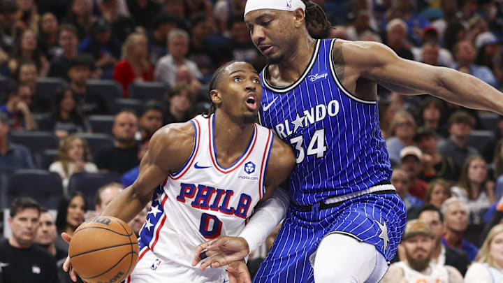 Jan 9, 2026; Orlando, Florida, USA; Philadelphia 76ers guard Tyrese Maxey (0) drives to the basket past Orlando Magic center Wendell Carter Jr. (34) in the second quarter at Kia Center. Mandatory Credit: Nathan Ray Seebeck-Imagn Images Jan 9, 2026; Orlando, Florida, USA; Philadelphia 76ers guard Tyrese Maxey (0) drives to the basket past Orlando Magic center Wendell Carter Jr. (34) in the second quarter at Kia Center. Mandatory Credit: Nathan Ray Seebeck-Imagn Images