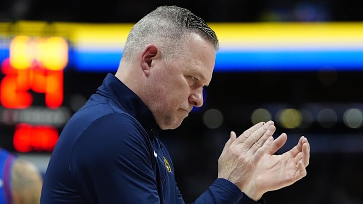 Feb 3, 2025; Denver, Colorado, USA; Denver Nuggets head coach Michael Malone reacts in the first quarter against the New Orleans Pelicans at Ball Arena. Mandatory Credit: Ron Chenoy-Imagn Images