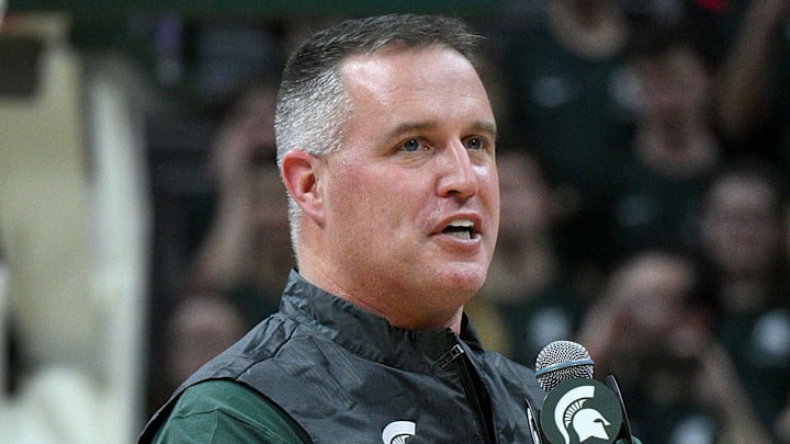 Dec 2, 2025; East Lansing, Michigan, USA;  Michigan State head football coach Pat Fitzgerald watches the Spartans defeat the Iowa Hawkeyes at Jack Breslin Student Events Center. Mandatory Credit: Dale Young-Imagn Images