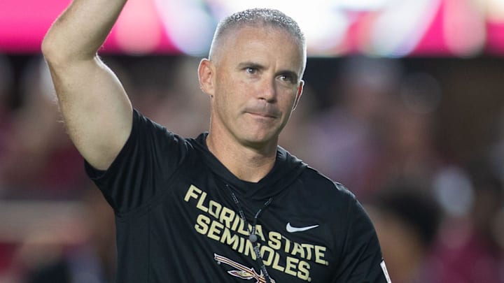 Florida State Seminoles head coach Mike Norvell walks down the field. The Miami Hurricanes lead the Florida State Seminoles 14-3 at the half on Saturday, Oct. 4, 2025.