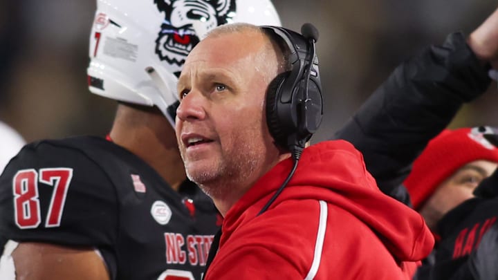 Nov 21, 2024; Atlanta, Georgia, USA; North Carolina State Wolfpack head coach Dave Doeren on the sideline against the Georgia Tech Yellow Jackets in the fourth quarter at Bobby Dodd Stadium at Hyundai Field. Mandatory Credit: Brett Davis-Imagn Images