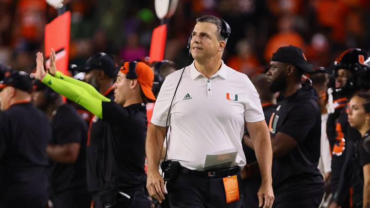 Oct 26, 2024; Miami Gardens, Florida, USA; Miami Hurricanes head coach Mario Cristobal watches from the sideline against the Florida State Seminoles during the third quarter at Hard Rock Stadium. Mandatory Credit: Sam Navarro-Imagn Images