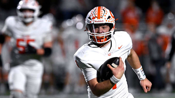 Celina quarterback Bowe Bentley scrambles with the ball during the Bobcats’ Class 4A Div. I semi-final game against West Plains in Abilene Dec. 13, 2024. Final score was 43-36, Celina. Celina quarterback Bowe Bentley scrambles with the ball during the Bobcats’ Class 4A Div. I semi-final game against West Plains in Abilene Dec. 13, 2024. Final score was 43-36, Celina.