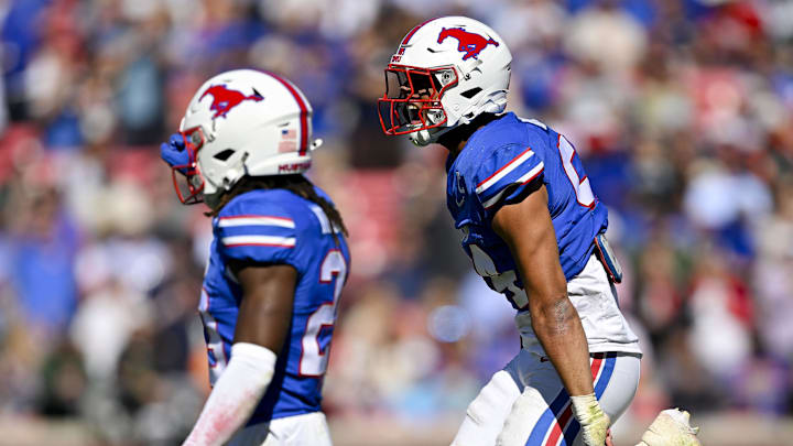 Nov 1, 2025; Dallas, Texas, USA; SMU Mustangs linebacker Mark Iheanachor (24) celebrates after the defense makes a stop against the Miami Hurricanes during the second half at Gerald J. Ford Stadium. Mandatory Credit: Jerome Miron-Imagn Images Nov 1, 2025; Dallas, Texas, USA; SMU Mustangs linebacker Mark Iheanachor (24) celebrates after the defense makes a stop against the Miami Hurricanes during the second half at Gerald J. Ford Stadium. Mandatory Credit: Jerome Miron-Imagn Images