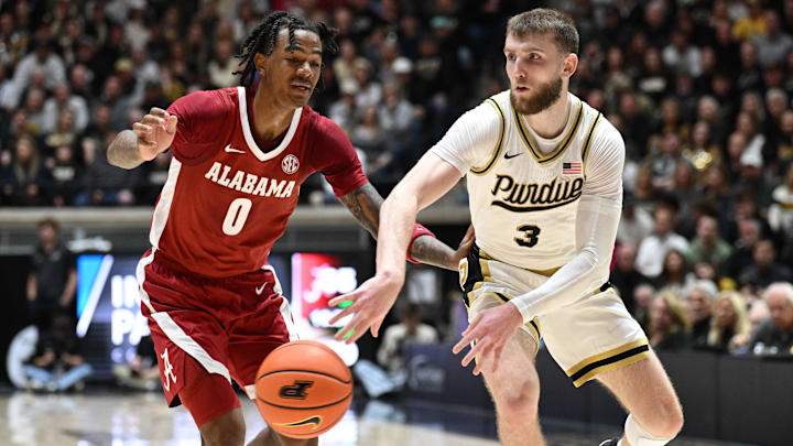 Purdue Boilermakers guard Braden Smith (3) passes the ball around Alabama Crimson Tide guard Labaron Philon (0)