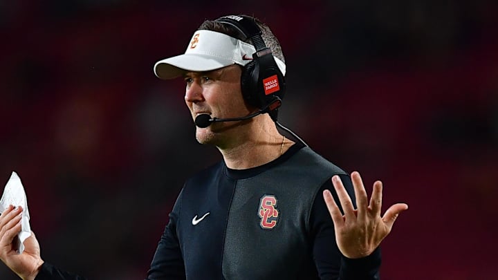 Sep 20, 2025; Los Angeles, California, USA; Southern California Trojans head coach Lincoln Riley watches game action against the Michigan State Spartans during the second half at the Los Angeles Memorial Coliseum. Mandatory Credit: Gary A. Vasquez-Imagn Images