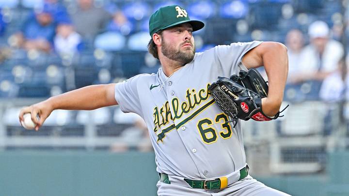 Aug 17, 2026; Kansas City, Missouri, USA;  Athletics starting pitcher Mason Barnett (63) throws a pitch in the first inning against the Kansas City Royals at Kauffman Stadium. Mandatory Credit: Peter Aiken-Imagn Images