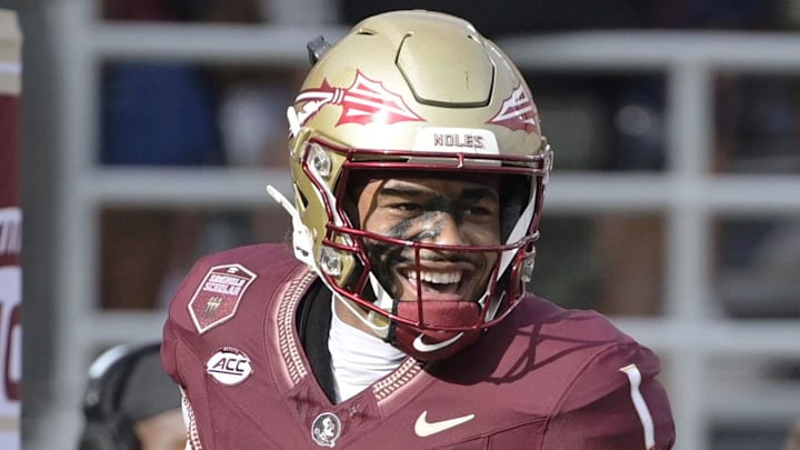 Aug 30, 2025; Tallahassee, Florida, USA; Florida State Seminoles quarterback Tommy Castellanos (1) celebrates with wide receiver Micahi Danzy (19) after a touchdown against the Alabama Crimson Tide during the second half at Doak S. Campbell Stadium. Mandatory Credit: Melina Myers-Imagn Images