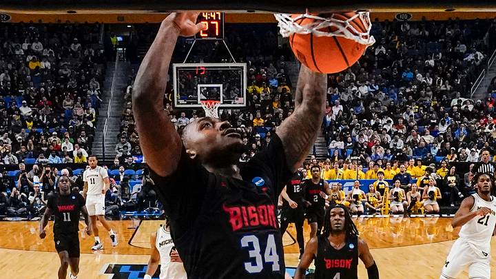Mar 19, 2026; Buffalo, NY, USA; Howard Bison guard Bryce Harris (34) dunks the ball against the Michigan Wolverines during the second half of a first round game of the men's 2026 NCAA Tournament at Keybank Center. Mandatory Credit: Gregory Fisher-Imagn Images Mar 19, 2026; Buffalo, NY, USA; Howard Bison guard Bryce Harris (34) dunks the ball against the Michigan Wolverines during the second half of a first round game of the men's 2026 NCAA Tournament at Keybank Center. Mandatory Credit: Gregory Fisher-Imagn Images
