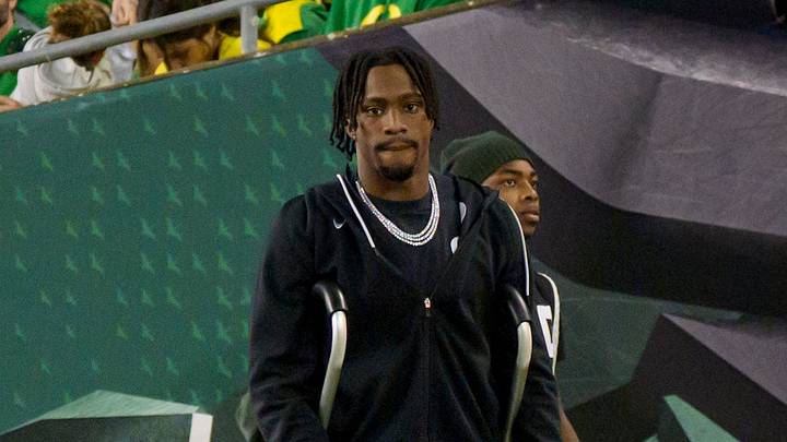 Oregon wide receiver Jeremiah McClellan walks on the field in a boot as the Oregon Ducks host the Portland State Vikings on Sept. 18, 2026, at Autzen Stadium in Eugene, Oregon. Oregon wide receiver Jeremiah McClellan walks on the field in a boot as the Oregon Ducks host the Portland State Vikings on Sept. 18, 2026, at Autzen Stadium in Eugene, Oregon.