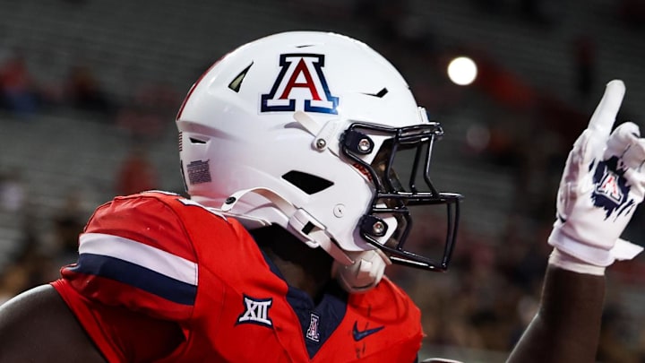 Sep 6, 2025; Tucson, Arizona, USA; Arizona Wildcats defensive back Johno Price (21) points up after scoring a touchdown during the third quarter of the game against the Weber State Wildcats at Arizona Stadium. Mandatory Credit: Aryanna Frank-Imagn Images Sep 6, 2025; Tucson, Arizona, USA; Arizona Wildcats defensive back Johno Price (21) points up after scoring a touchdown during the third quarter of the game against the Weber State Wildcats at Arizona Stadium. Mandatory Credit: Aryanna Frank-Imagn Images