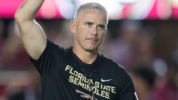 Florida State Seminoles head coach Mike Norvell walks down the field. The Miami Hurricanes lead the Florida State Seminoles 14-3 at the half on Saturday, Oct. 4, 2025.