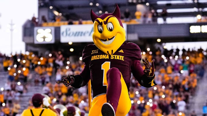 Aug 30, 2025; Tempe, Arizona, USA; Sparky the Sun Devil takes the field pregame between Arizona State Sun Devils and Northern Arizona Lumberjacks at Mountain America Stadium. Mandatory Credit: Arianna Grainey-Imagn Images Aug 30, 2025; Tempe, Arizona, USA; Sparky the Sun Devil takes the field pregame between Arizona State Sun Devils and Northern Arizona Lumberjacks at Mountain America Stadium. Mandatory Credit: Arianna Grainey-Imagn Images