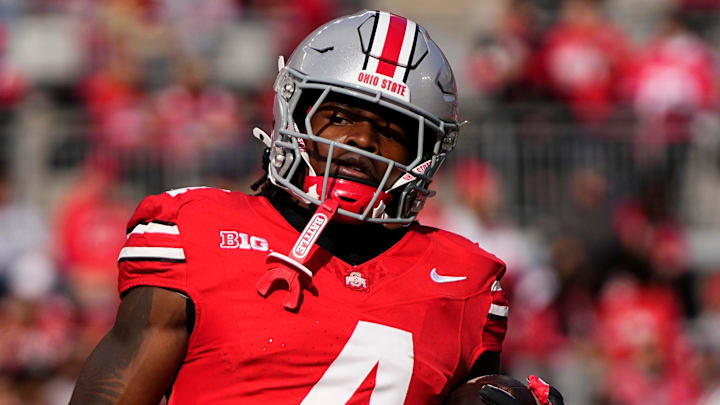 Ohio State Buckeyes wide receiver Jeremiah Smith (4) warms up prior to the NCAA football game against the Nebraska Cornhuskers at Ohio Stadium in Columbus on Saturday, Oct. 26, 2024. Ohio State Buckeyes wide receiver Jeremiah Smith (4) warms up prior to the NCAA football game against the Nebraska Cornhuskers at Ohio Stadium in Columbus on Saturday, Oct. 26, 2024.