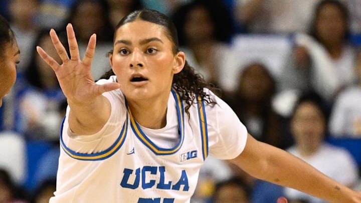 Nov 24, 2024; Los Angeles, California, USA; UCLA Bruins center Lauren Betts (51) defends South Carolina Gamecocks guard Bree Hall (23) during the first quarter at Pauley Pavilion presented by Wescom. Mandatory Credit: Robert Hanashiro-Imagn Images