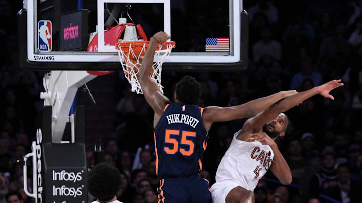 Oct 28, 2024; New York, New York, USA; New York Knicks center Ariel Hukporti (55) is called for an offensive foul against Cleveland Cavaliers forward Evan Mobley (4) during the second half at Madison Square Garden. Mandatory Credit: John Jones-Imagn Images