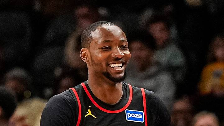 Feb 24, 2026; Atlanta, Georgia, USA; Atlanta Hawks forward Jonathan Kuminga (0) reacts with center Jock Landale (31) after scoring against the Washington Wizards during the first half at State Farm Arena. Mandatory Credit: Dale Zanine-Imagn Images