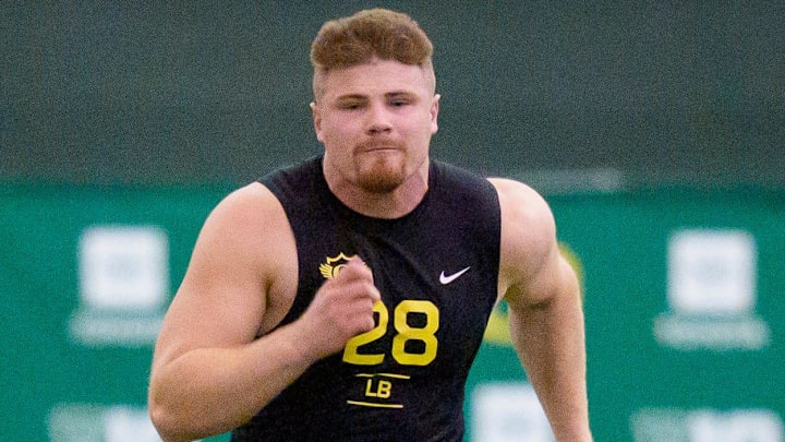 Oregon inside linebacker Bryce Boettcher competes in the 40-yard dash during Oregon Pro Day on March 17, 2026, at the Moshofsky Center in Eugene, Oregon. Oregon inside linebacker Bryce Boettcher competes in the 40-yard dash during Oregon Pro Day on March 17, 2026, at the Moshofsky Center in Eugene, Oregon.