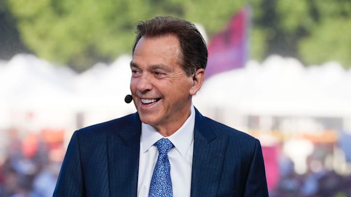 Former Alabama coach Nick Saban smiles