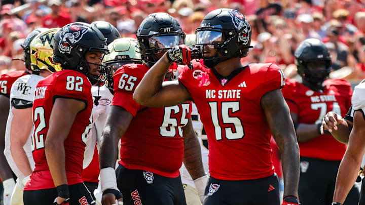 Oct 5, 2024; Raleigh, North Carolina, USA; North Carolina State Wolfpack tight end Justin Joly (15) celebrates during the first half of the game against Wake Forest Demon Deacons at Carter-Finley Stadium. Mandatory Credit: Jaylynn Nash-Imagn Images