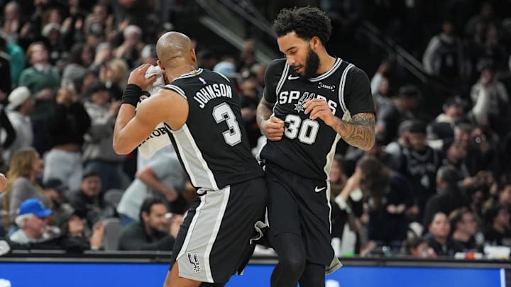 Jan 25, 2026; San Antonio, Texas, USA; San Antonio Spurs forwards Keldon Johnson (3) and Julian Champagnie (30) celebrate in the second half against the New Orleans Pelicans at Frost Bank Center. Mandatory Credit: Daniel Dunn-Imagn Images Jan 25, 2026; San Antonio, Texas, USA; San Antonio Spurs forwards Keldon Johnson (3) and Julian Champagnie (30) celebrate in the second half against the New Orleans Pelicans at Frost Bank Center. Mandatory Credit: Daniel Dunn-Imagn Images
