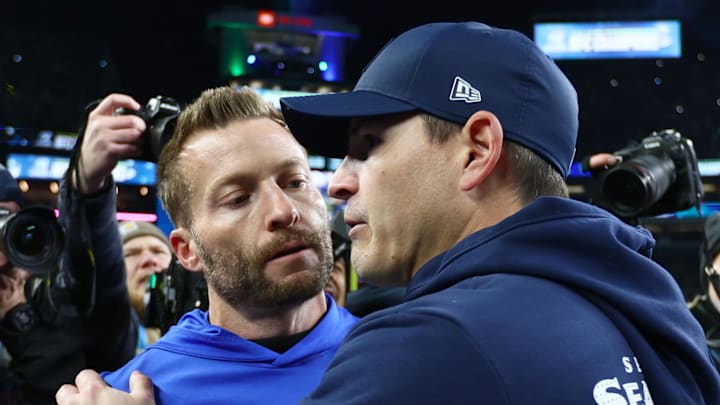 Seattle Seahawks head coach Mike Macdonald greets Los Angeles Rams head coach Sean McVay on the field