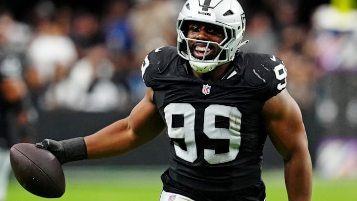 Oct 12, 2025; Paradise, Nevada, USA; Las Vegas Raiders defensive tackle Thomas Booker (99) reacts after a play during the second half against the Tennessee Titans at Allegiant Stadium. Mandatory Credit: Stephen R. Sylvanie-Imagn Images