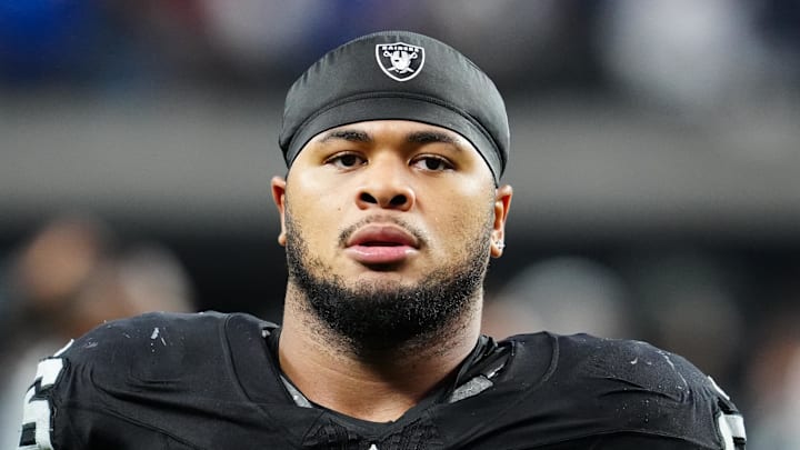 Dec 28, 2025; Paradise, Nevada, USA; Las Vegas Raiders defensive tackle Jonah Laulu (96) exits the field after the game against the New York Giants at Allegiant Stadium. Mandatory Credit: Stephen R. Sylvanie-Imagn Images