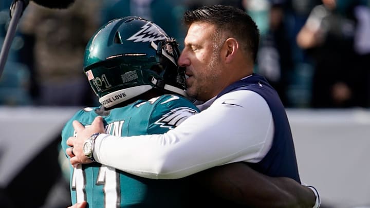 Dec 4, 2022; Philadelphia, Pennsylvania, USA; Tennessee Titans head coach Mike Vrabel hugs Philadelphia Eagles wide receiver A.J. Brown (11) as the teams get ready to face off at Lincoln Financial Field.