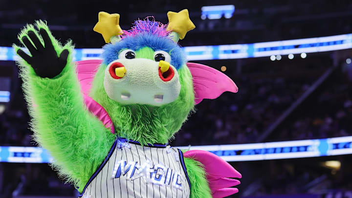 Dec 1, 2025; Orlando, Florida, USA; Orlando Magic mascot Stuff waves to fans during the first quarter against the Chicago Bulls at Kia Center. Mandatory Credit: Mike Watters-Imagn Images