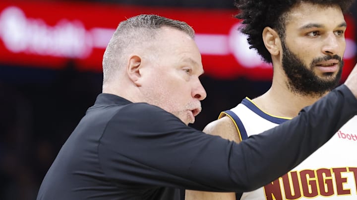 Mar 9, 2025; Oklahoma City, Oklahoma, USA; Denver Nuggets head coach Michael Malone talks to guard Jamal Murray (27) during a break in the game against the Oklahoma City Thunder during the second quarter at Paycom Center. Mandatory Credit: Alonzo Adams-Imagn Images