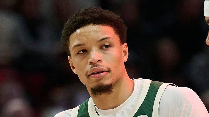 Milwaukee Bucks guard Ryan Rollins (13) directs a teammate during the first half against Portland Trail Blazers forward Toumani Camara (33) at Moda Center on March 25, 2026.