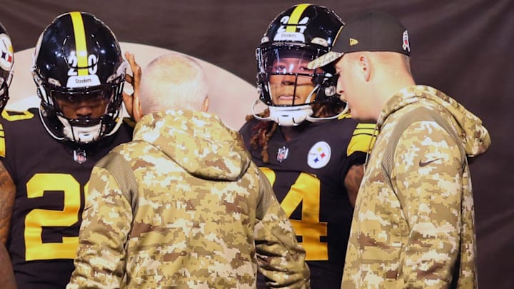 Nov 8, 2021; Pittsburgh, Pennsylvania, USA;  Pittsburgh Steelers wide receiver Ray-Ray McCloud (14) and running back Kalen Ballage (29) and cornerback Cameron Sutton (20) and running back Benny Snell (24) listen to special teams coaches Danny Smith(RC) and Blaine Stewart (right) before the game against the Chicago Bears at Heinz Field. Mandatory Credit: Charles LeClaire-Imagn Images