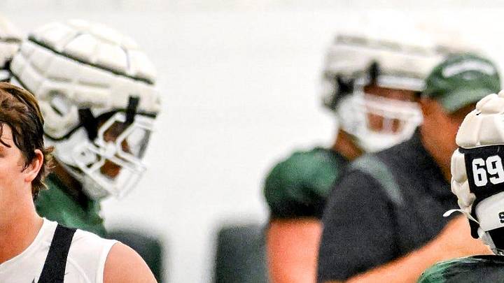 Michigan State's Rakeem Johnson, right, and Jacob Merritt run a drill during camp on Monday, Aug. 5, 2024, at the indoor practice facility in East Lansing. Michigan State's Rakeem Johnson, right, and Jacob Merritt run a drill during camp on Monday, Aug. 5, 2024, at the indoor practice facility in East Lansing.