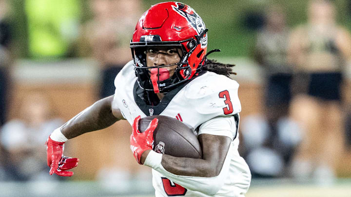 Sep 11, 2025; Winston-Salem, North Carolina, USA; North Carolina State Wolfpack running back Hollywood Smothers (3) runs the ball in the first half against the Wake Forest Demon Deacons at Allegacy Federal Credit Union Stadium. Mandatory Credit: Luke Jamroz-Imagn Images Sep 11, 2025; Winston-Salem, North Carolina, USA; North Carolina State Wolfpack running back Hollywood Smothers (3) runs the ball in the first half against the Wake Forest Demon Deacons at Allegacy Federal Credit Union Stadium. Mandatory Credit: Luke Jamroz-Imagn Images