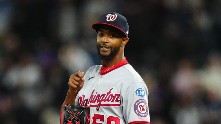 Apr 8, 2023; Denver, Colorado, USA; Washington Nationals relief pitcher Carl Edwards Jr. (58) reacts in the ninth inning against the Colorado Rockies at Coors Field. Mandatory Credit: Ron Chenoy-Imagn Images Apr 8, 2023; Denver, Colorado, USA; Washington Nationals relief pitcher Carl Edwards Jr. (58) reacts in the ninth inning against the Colorado Rockies at Coors Field. Mandatory Credit: Ron Chenoy-Imagn Images