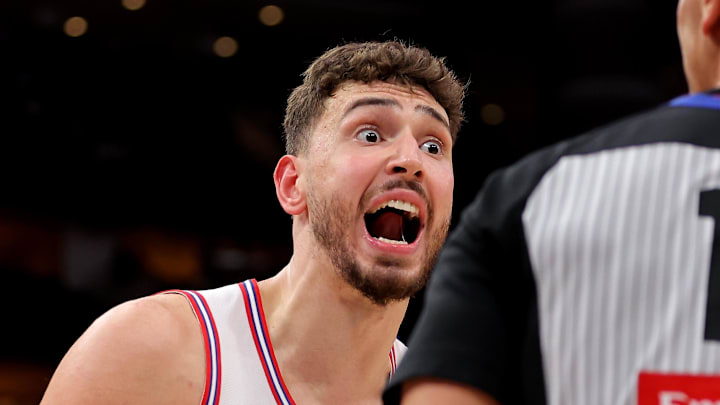 Apr 9, 2026; Houston, Texas, USA; Houston Rockets center Alperen Sengun (28) reacts to a foul called by referee Zach Zarba (15) during the first quarter against the Philadelphia 76ers during the first quarter at Toyota Center. Mandatory Credit: Erik Williams-Imagn Images
