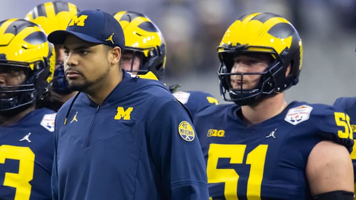 Dec 31, 2022; Glendale, Arizona, USA; Michigan Wolverines tight ends coach Grant Newsome against the Dec 31, 2022; Glendale, Arizona, USA; Michigan Wolverines tight ends coach Grant Newsome against the