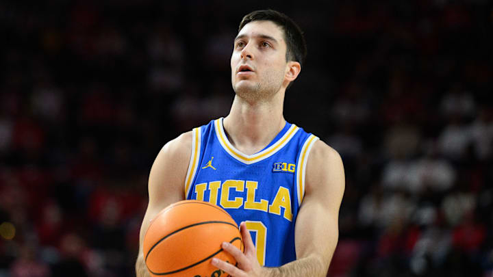 Jan 10, 2025; College Park, Maryland, USA; UCLA Bruins guard Lazar Stefanovic (10) shoots a free throw during the first half against the Maryland Terrapins at Xfinity Center. Mandatory Credit: Reggie Hildred-Imagn Images