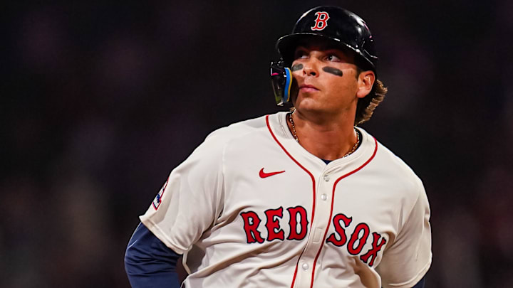 Boston Red Sox first base Triston Casas (36) hits a three-run home run against the Seattle Mariners in the seventh inning at Fenway Park.