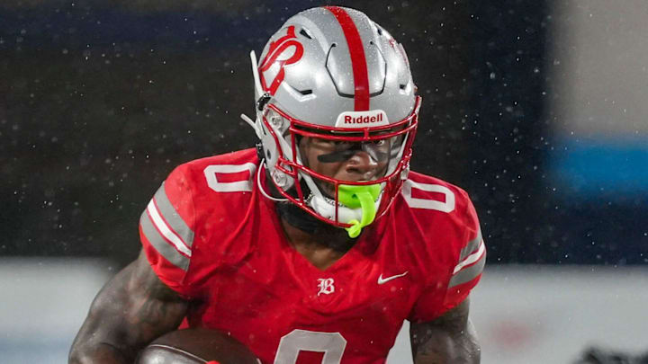 Baylor's David Gabriel Georges (0) carries the ball during the Division II-AAA championship game at Finley Stadium in Chattanooga, Tenn., on Dec. 4, 2025.